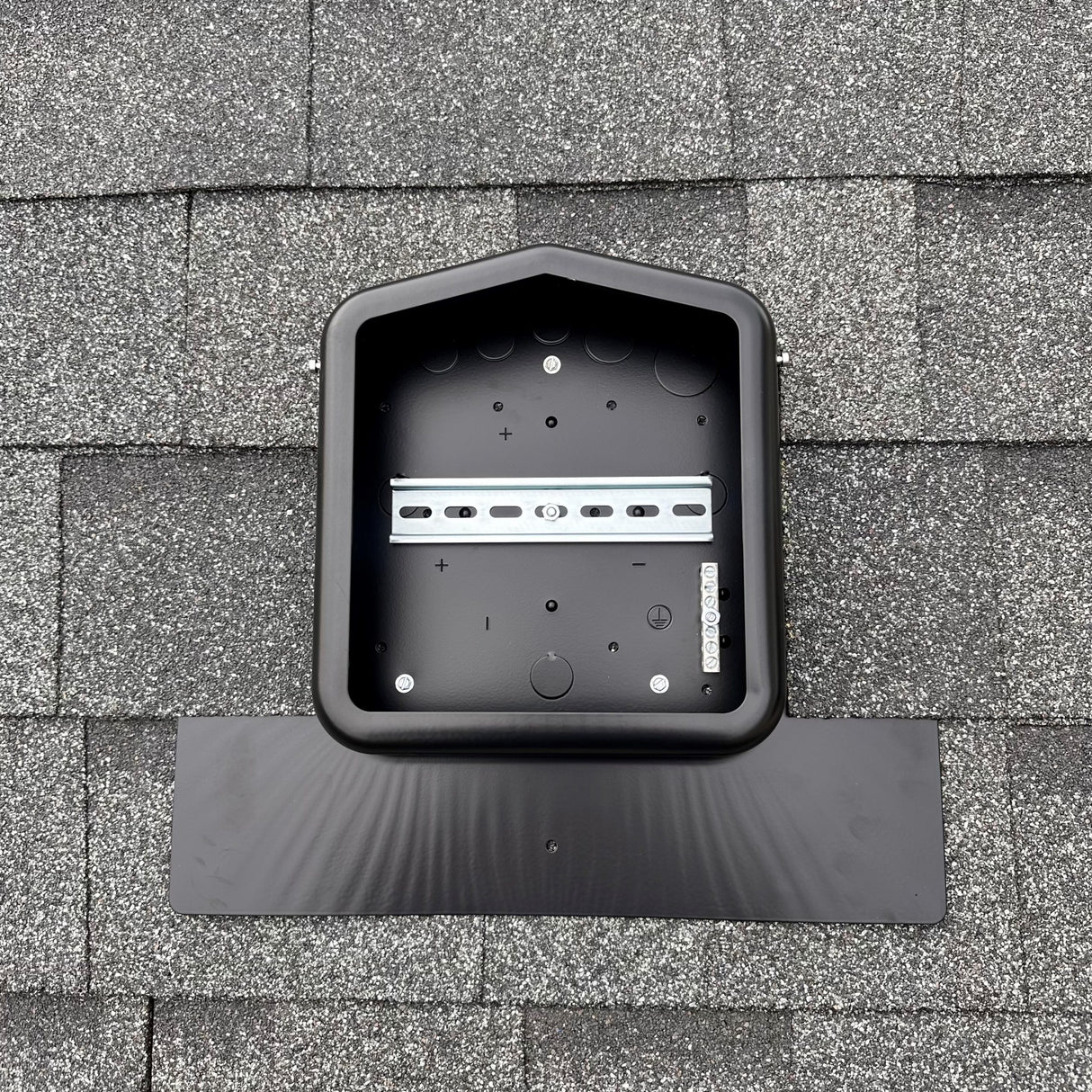 Soladeck Roof-Mounted Solar PV Junction Box on a roof