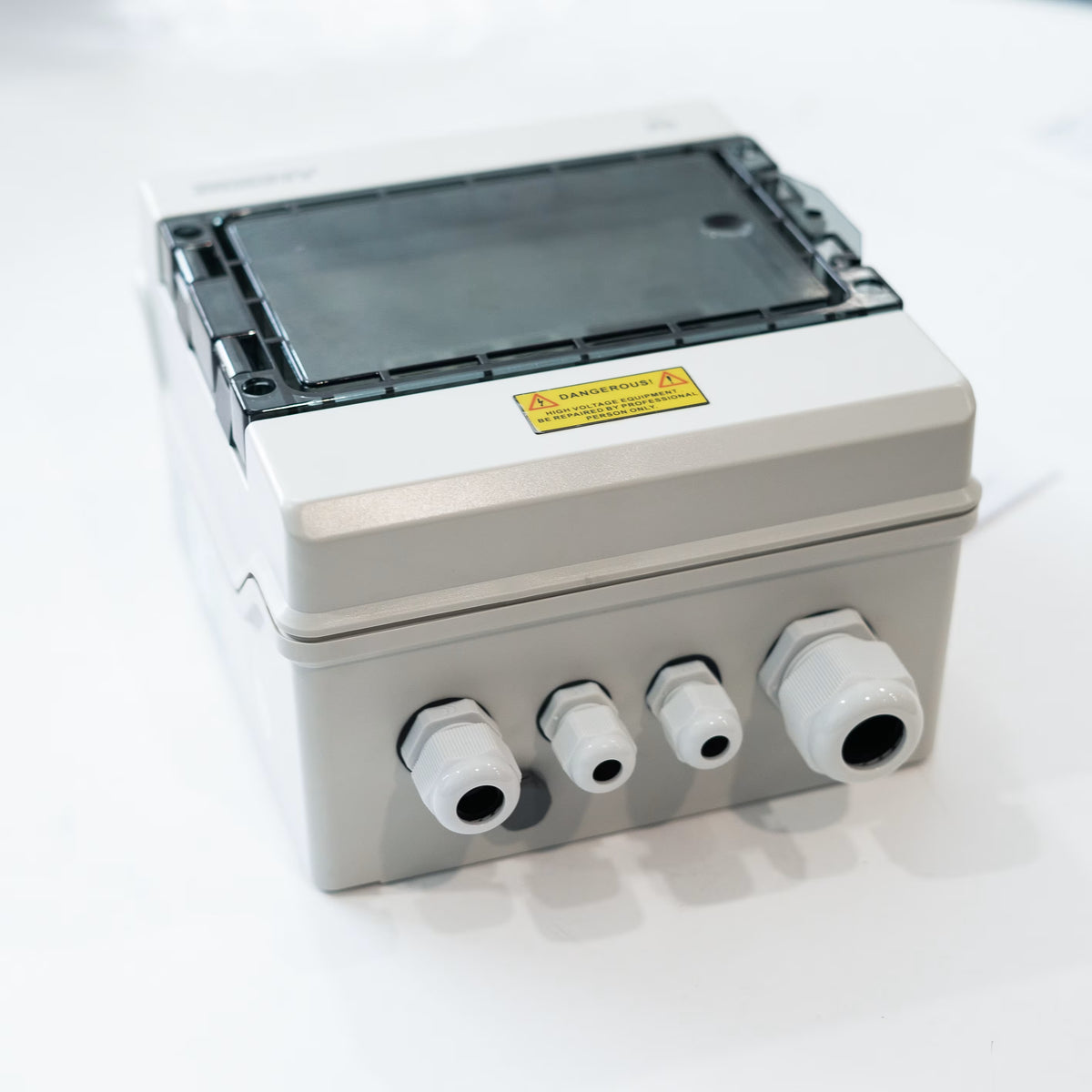 BENY BHS-1/1 1000V DC combiner box closed view showing transparent cover and cable glands