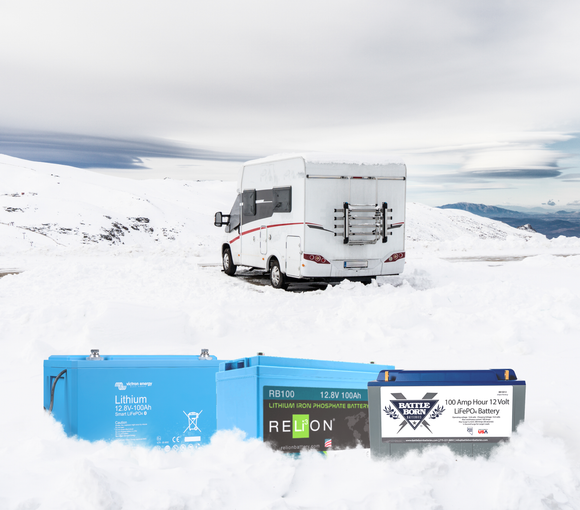 RELION, Battleborn and victron Energy Battery in snow in front of an RV