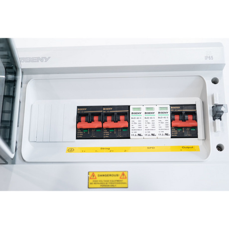 Close-up of the BENY BHS-2/1 combiner box breakers, surge protectors and terminals