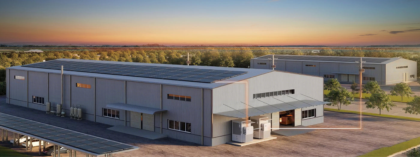 Commercial building with renewable energy products installed from Solis with a sunset in the background - Volts Energies