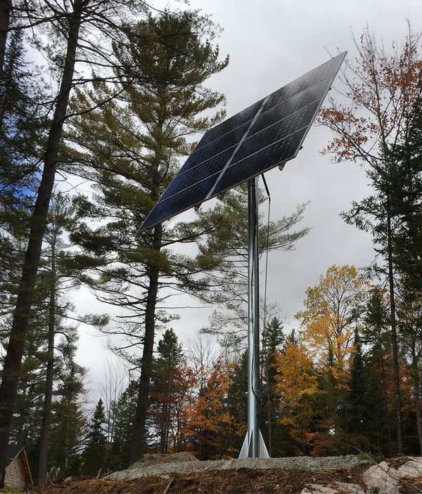 Pole-mounted solar panel in remote Canadian forest
