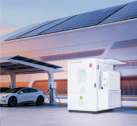 Solis Storage commercial battery energy storage unit beside a solar carport with EV charging stations