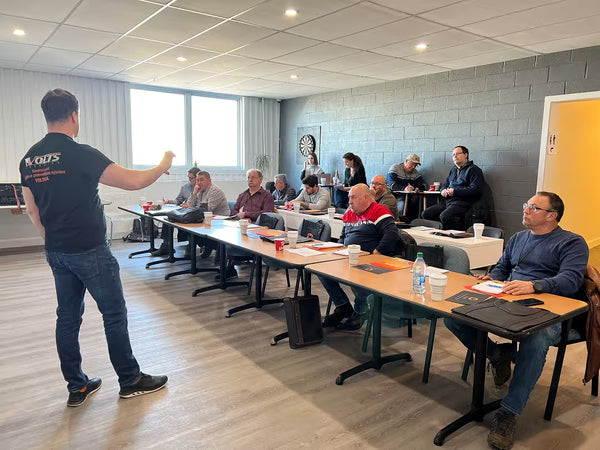 Volts Energies instructor leading a solar energy and battery storage dealer certification training session in Quebec